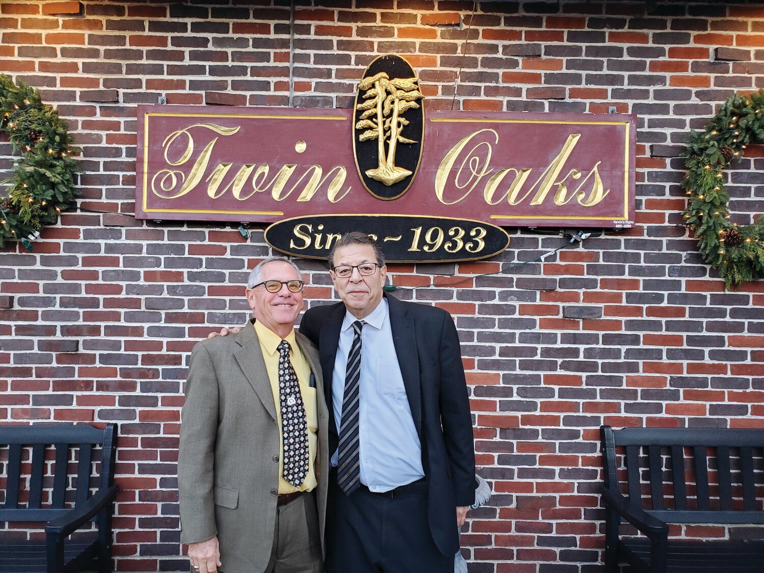 RETIRING TOGETHER: (Top) Joe Ferro (left) and Michael Regine (right) outside the restaurant in which they’ve put a collective 104 years of work.